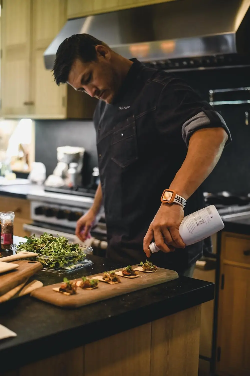 Chef Paul Aceto plating a private dinner in Miami